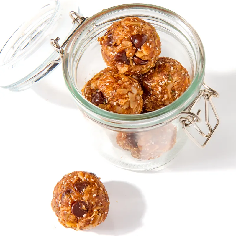 Almond butter energy bites in a glass jar