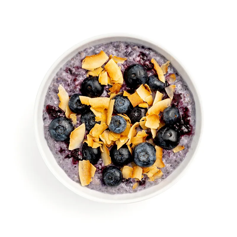 Blueberry chia overnight oats topped with blueberries and toasted coconut