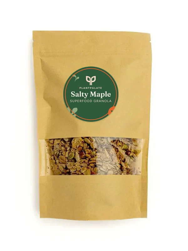 Salty Maple granola in a kraft bag with a round PlantPalate sticker