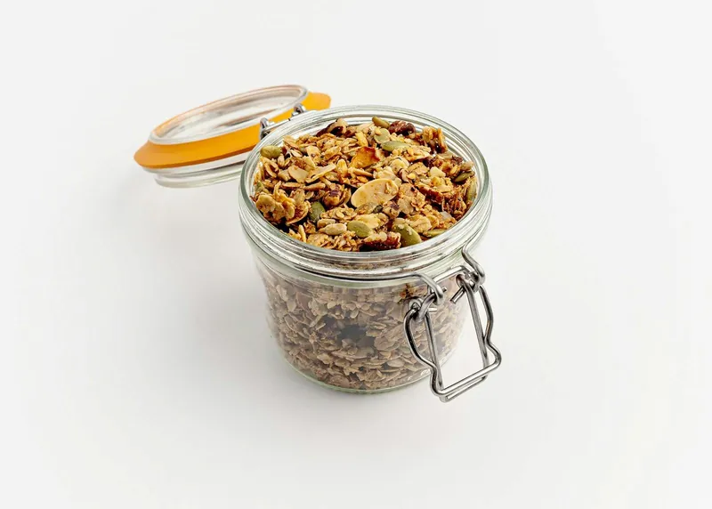 Salty Maple granola in a glass jar
