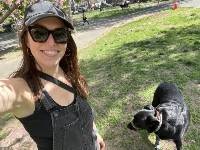 Emily in the park with her dog